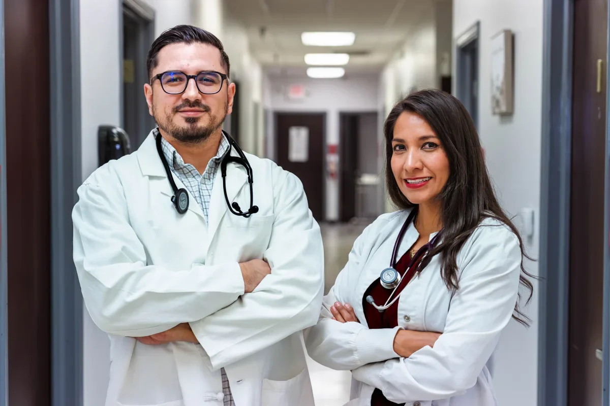 Santos Aguirre and Fabiola Wegmann inside Socorro Medical Clinic